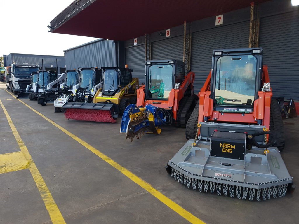 Wheeled vs. Tracked Skid Steers