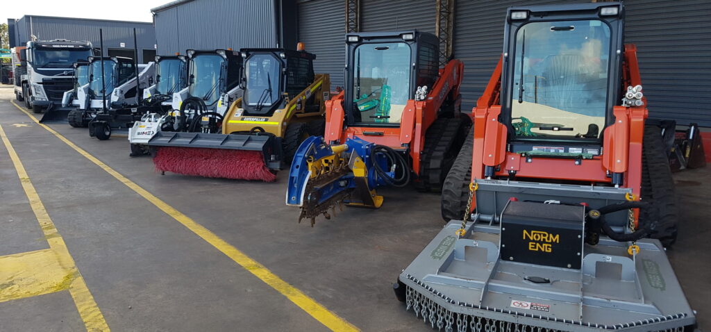Wheeled vs. Tracked Skid Steers