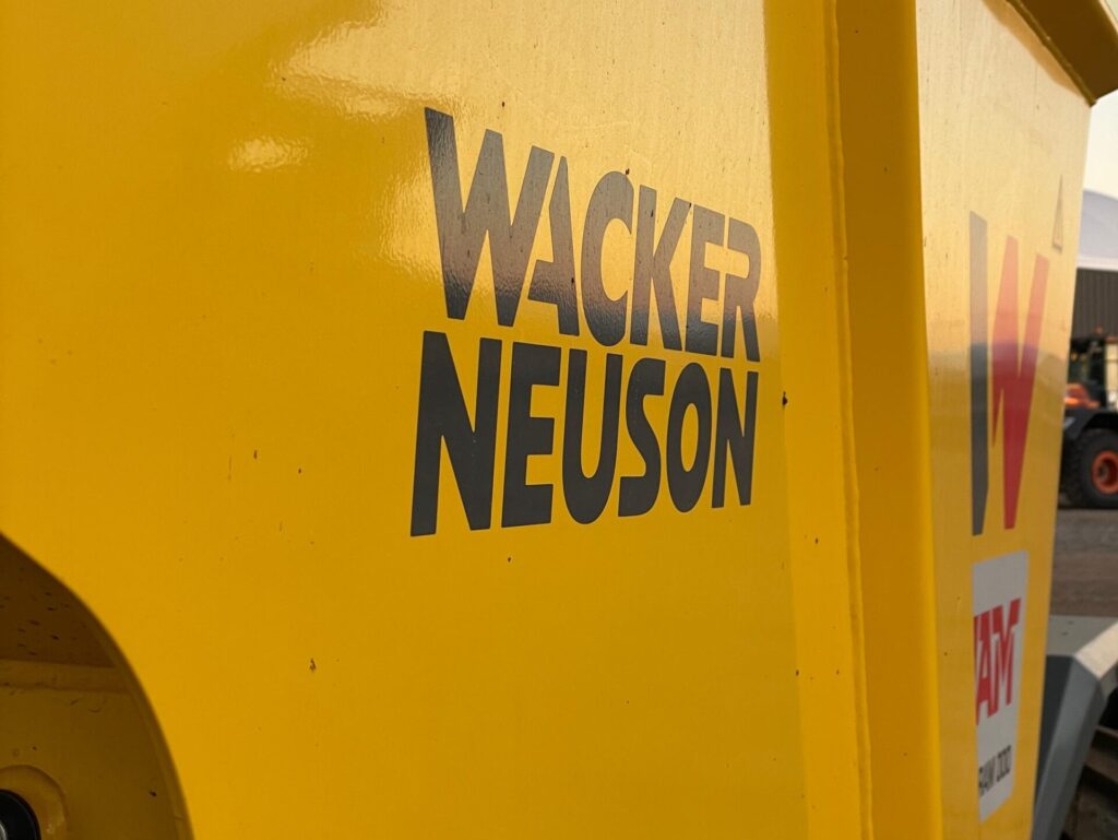 Close up of the Wacker Neuson Dumper Truck text on the side of the skip body